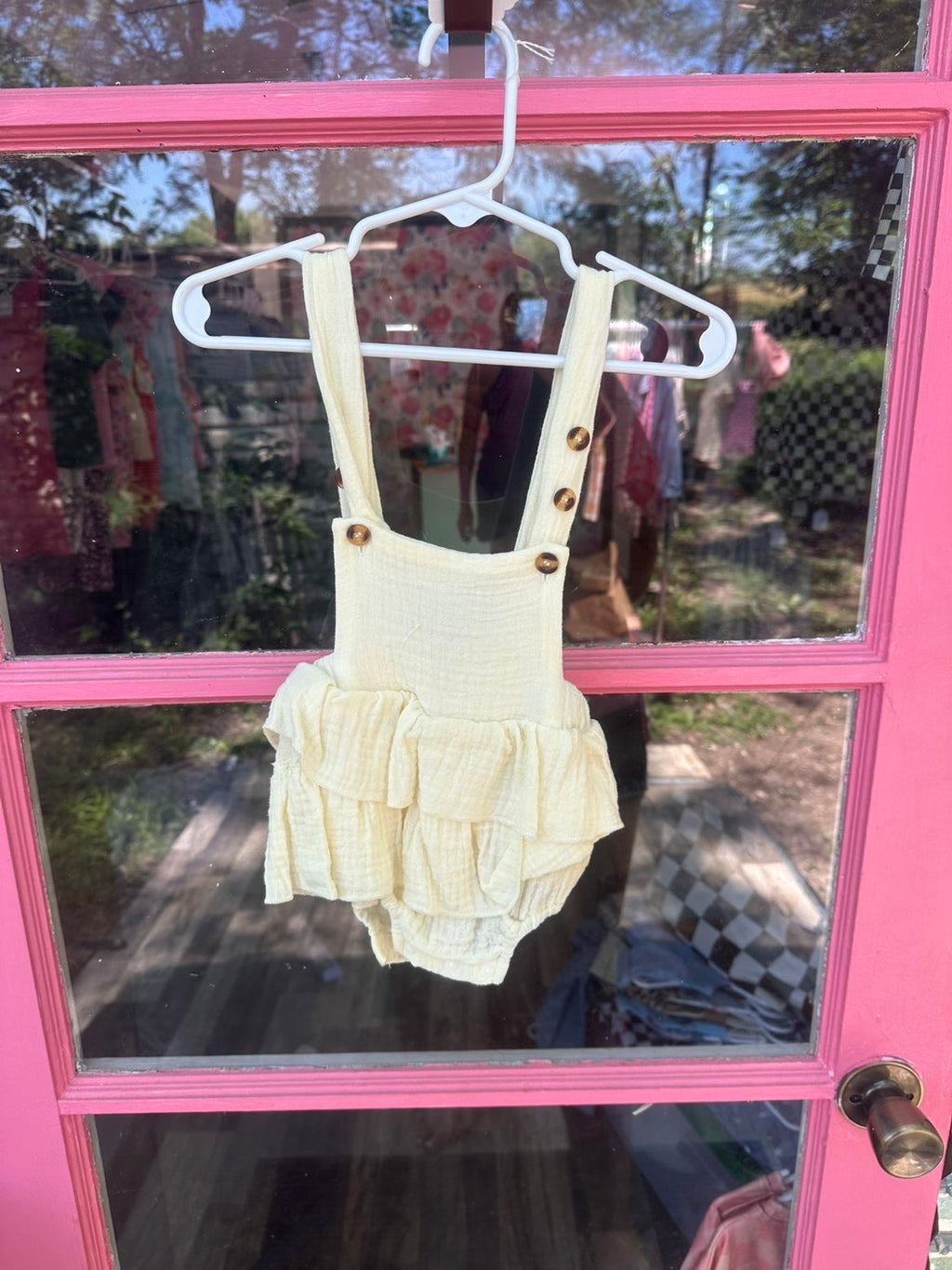 Cream overalls with buttons