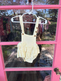 Cream overalls with buttons