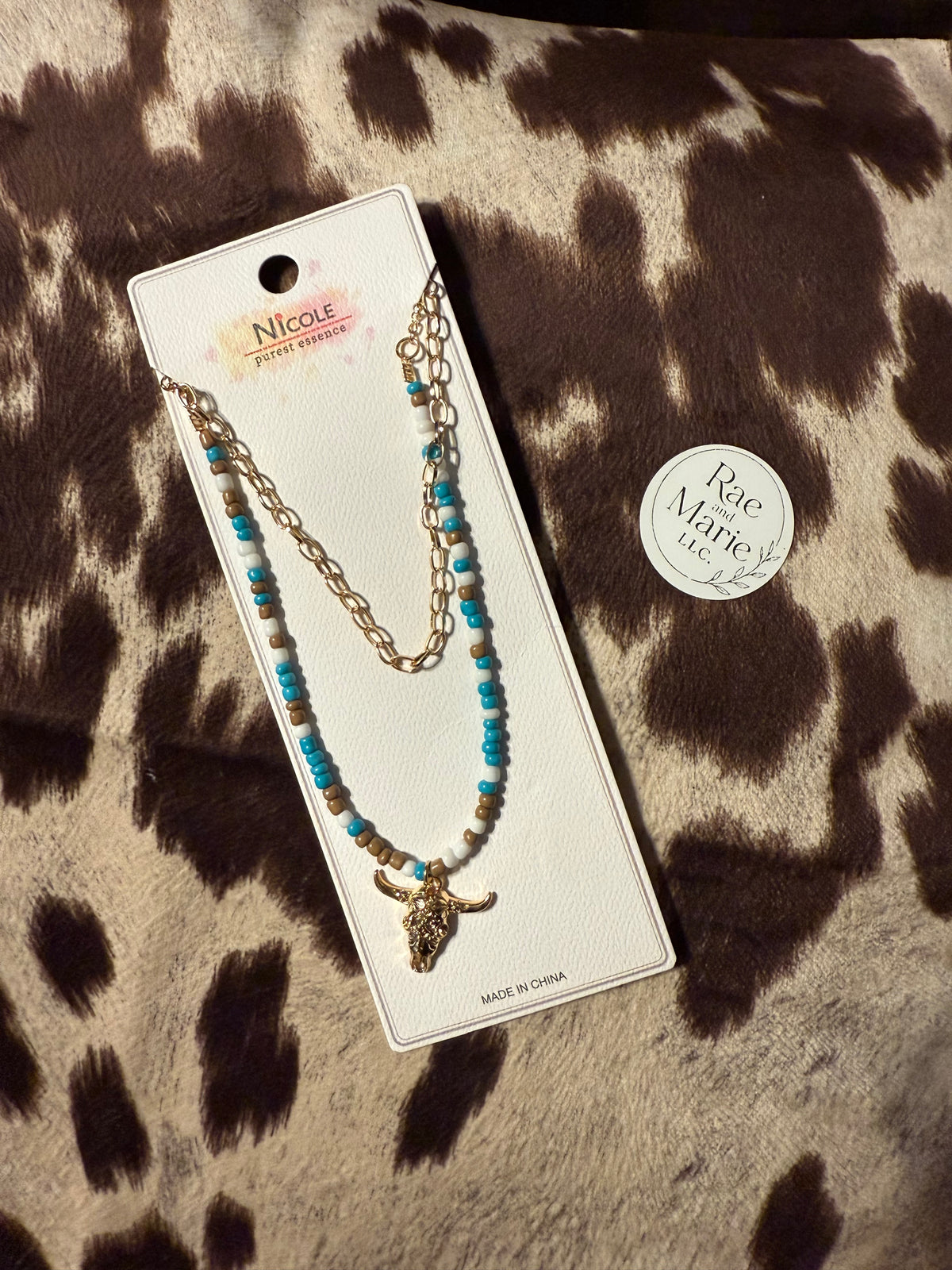 (Gold) Brown, White, and Blue Bull Skull Necklace